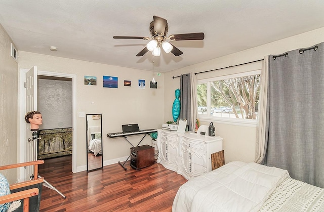 bedroom featuring dark hardwood / wood-style floors and ceiling fan