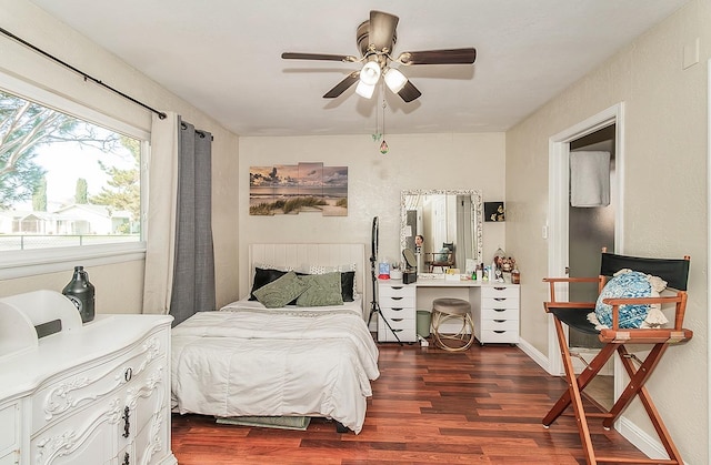 bedroom featuring ceiling fan and dark hardwood / wood-style flooring