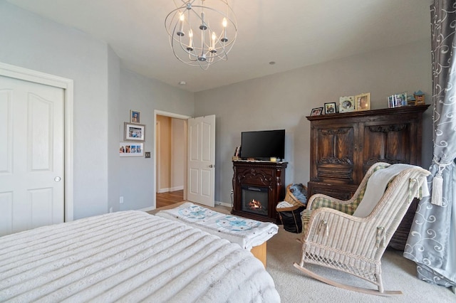 bedroom featuring a notable chandelier