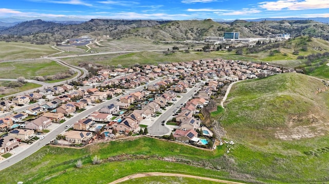 drone / aerial view featuring a mountain view