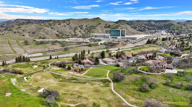 birds eye view of property with a mountain view