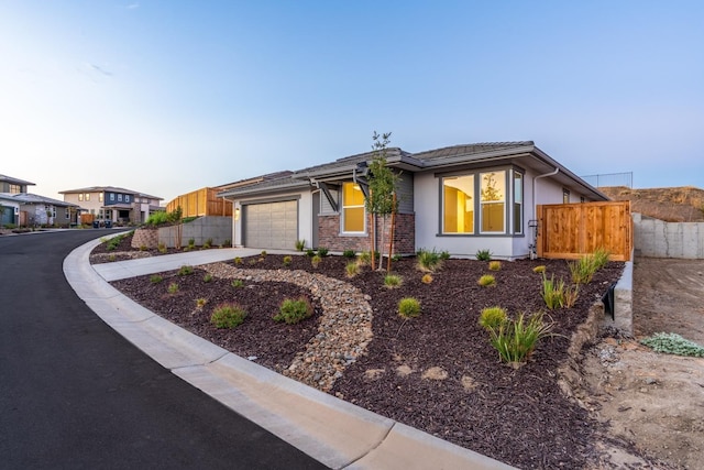 single story home featuring a garage