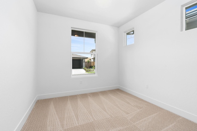 spare room featuring carpet flooring