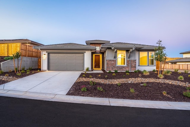 prairie-style home with a garage