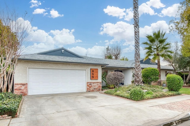 ranch-style house featuring a garage