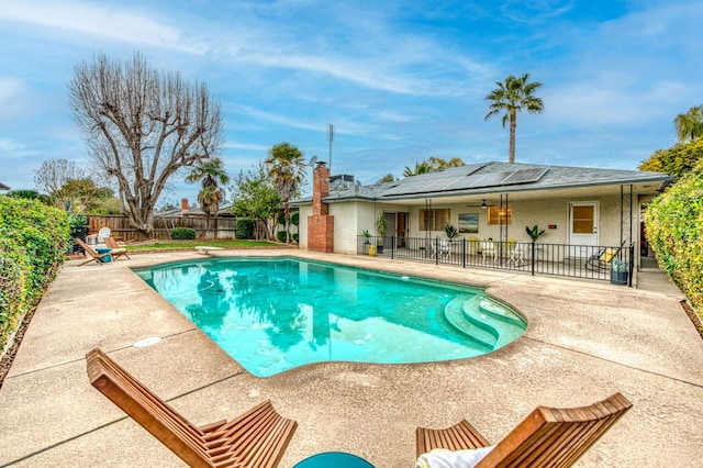 view of pool featuring a patio