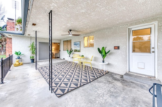 view of patio / terrace with ceiling fan