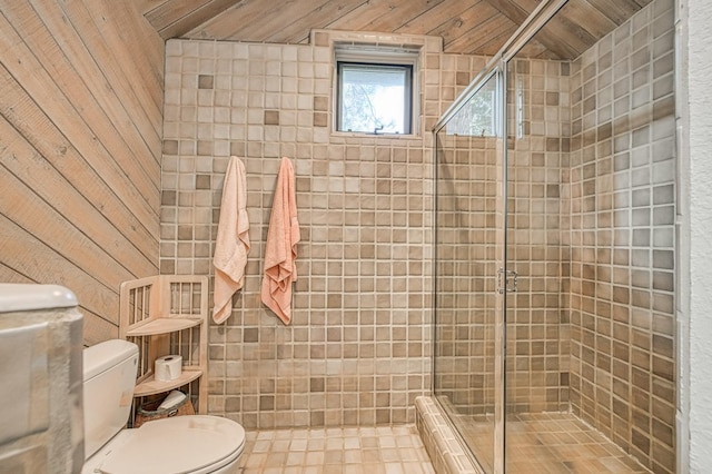 bathroom with walk in shower and toilet