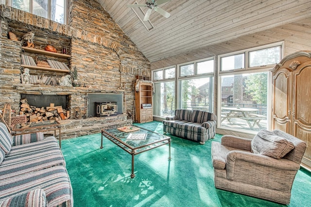 unfurnished living room featuring high vaulted ceiling, a healthy amount of sunlight, and ceiling fan