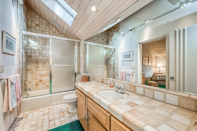 full bathroom with vanity, lofted ceiling with skylight, shower / bath combination with glass door, and wooden ceiling