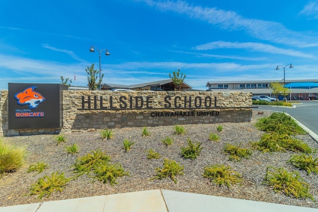 view of community sign