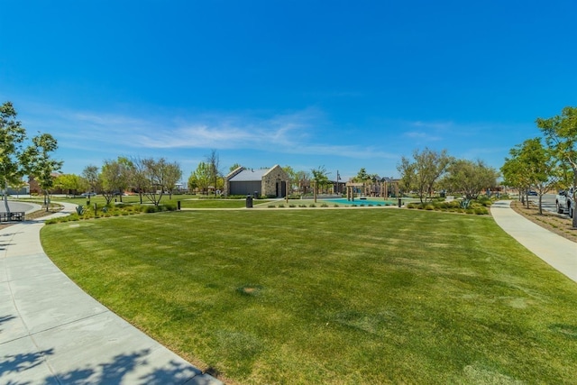 view of community with a lawn