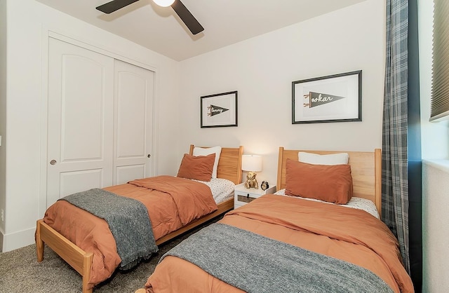 carpeted bedroom featuring a closet and a ceiling fan
