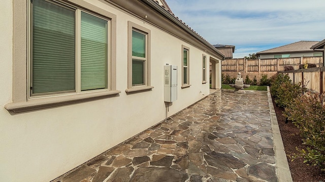 1009 Treasure Hills Dr, Madera, CA 93636 - view of home's exterior featuring a patio and stucco siding