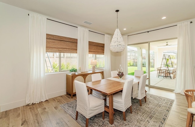 1009 Treasure Hills Dr, Madera, CA 93636 - dining room featuring light wood-type flooring, recessed lighting, baseboards, and a chandelier