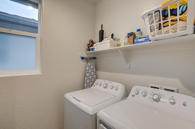 laundry area featuring washing machine and dryer