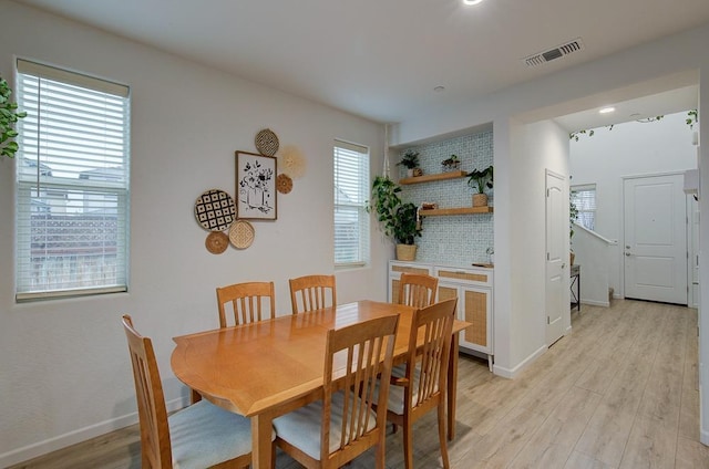 dining room featuring light hardwood / wood-style floors