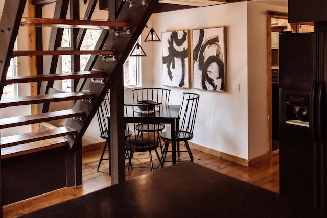 dining area with light hardwood / wood-style flooring