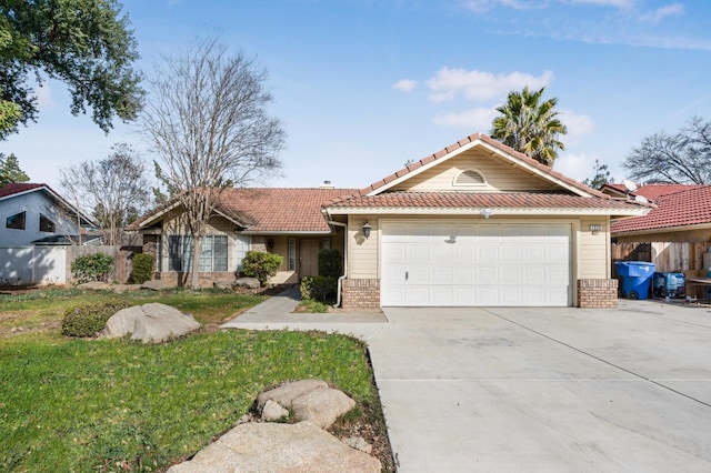 view of front of property featuring a garage and a front yard