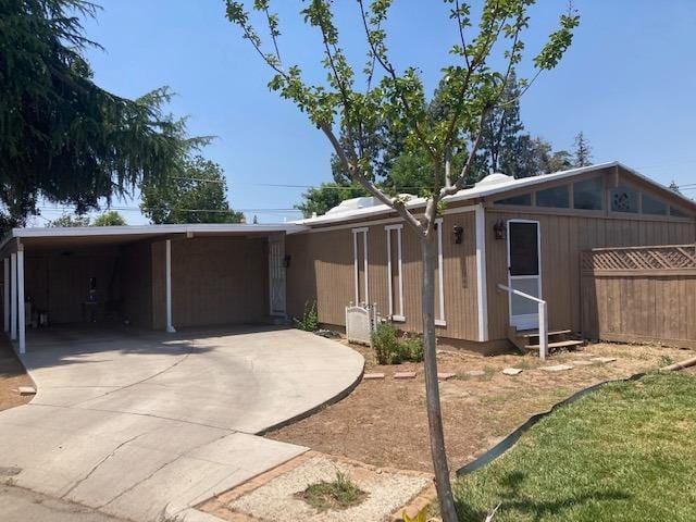 view of front facade with a carport