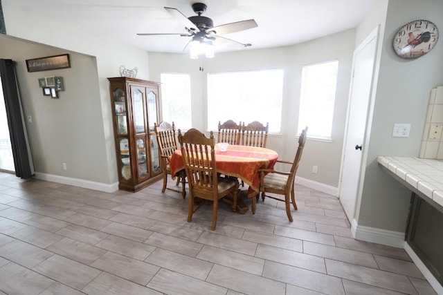 dining area featuring ceiling fan