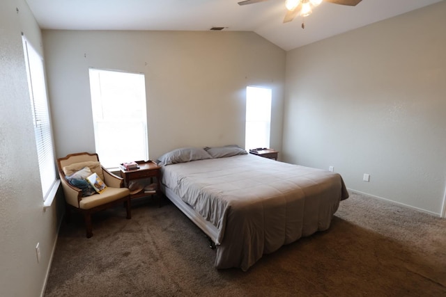 carpeted bedroom featuring ceiling fan and vaulted ceiling