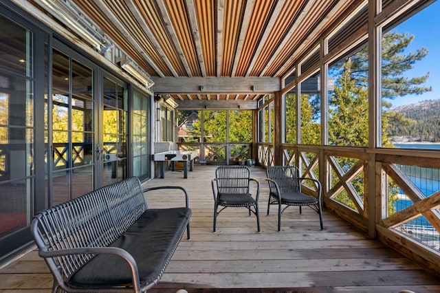 sunroom / solarium featuring a wealth of natural light