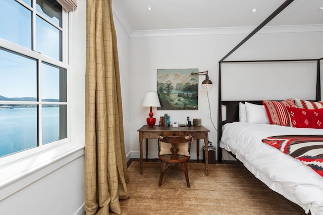 bedroom with crown molding