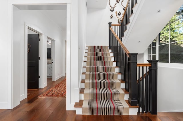 stairs with wood-type flooring