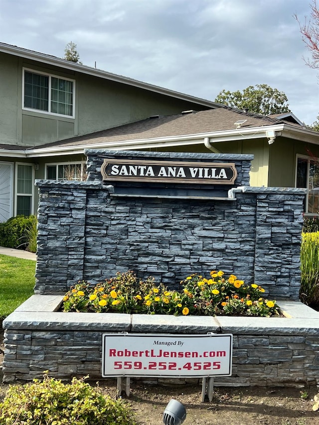 view of community sign