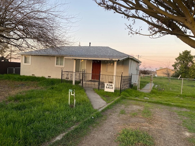 13208 S Marsh Ave, Caruthers, CA 93609 - bungalow featuring a gate, roof with shingles, crawl space, and stucco siding