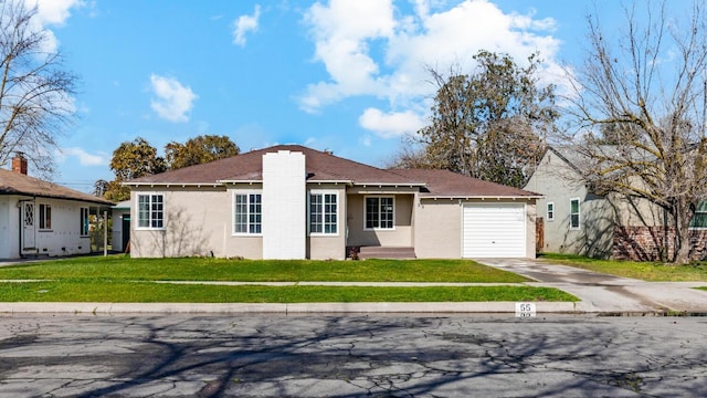 single story home featuring concrete driveway, an attached garage, stucco siding, and a front lawn