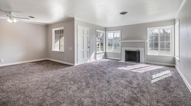unfurnished living room with baseboards, a ceiling fan, visible vents, and carpet floors