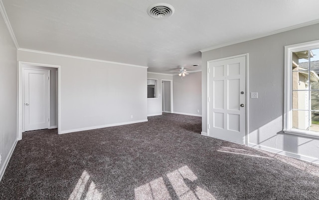 unfurnished living room featuring carpet flooring, visible vents, baseboards, and crown molding