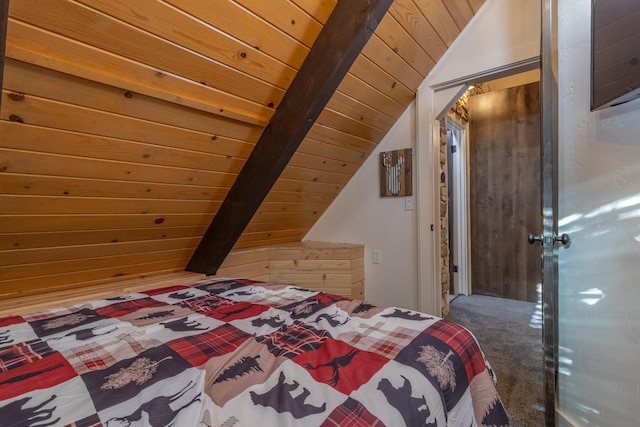 unfurnished bedroom with carpet, wood ceiling, and lofted ceiling with beams