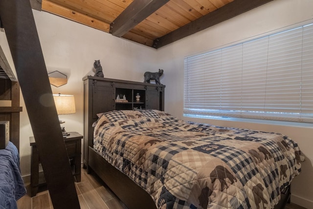 bedroom with wooden ceiling, beam ceiling, and wood finish floors