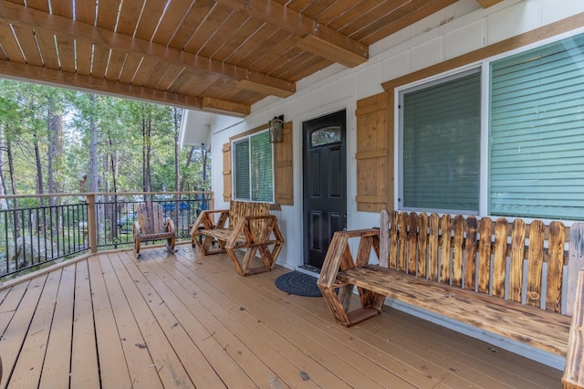 wooden terrace with covered porch