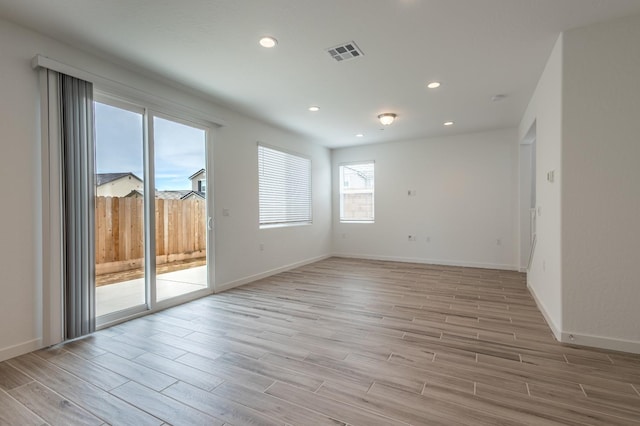 387 Thunder Rd S, Madera, CA 93636 - spare room with light wood finished floors, recessed lighting, and baseboards