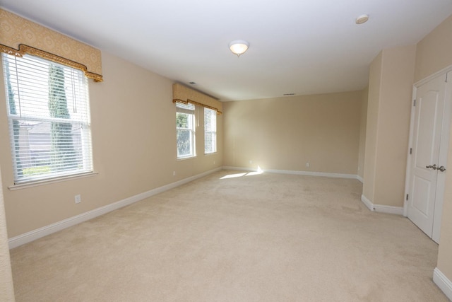 empty room with light carpet