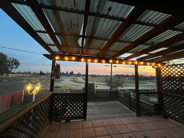 exterior space with a wooden deck and a pergola