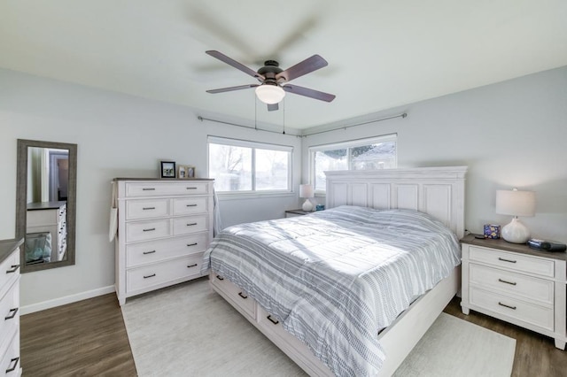 bedroom with light wood-type flooring and ceiling fan