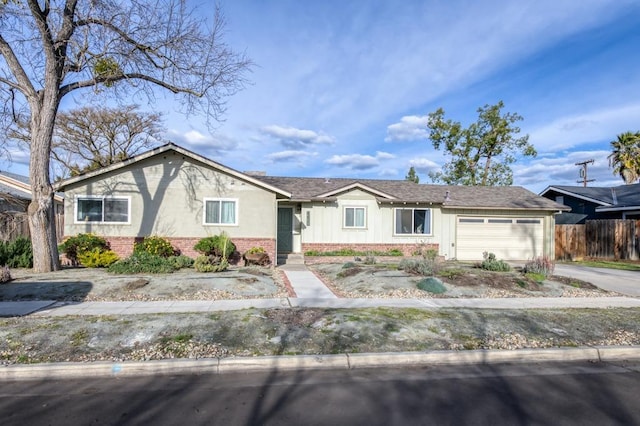 single story home featuring a garage