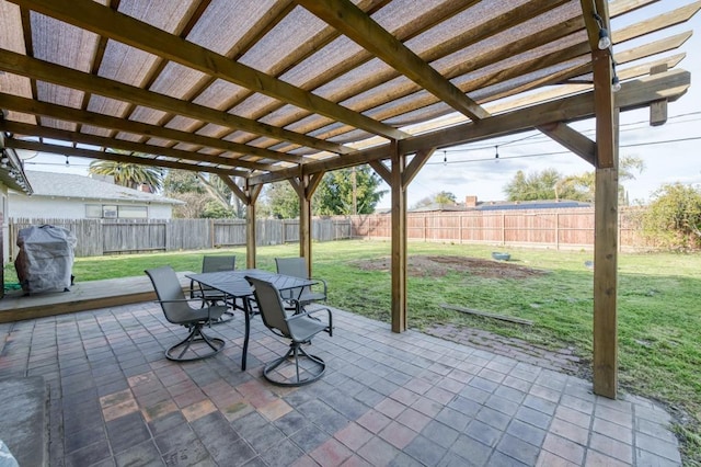 view of patio with a pergola and a grill