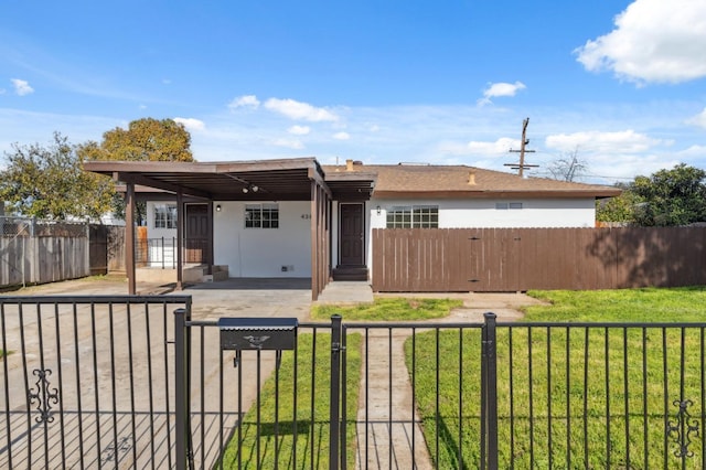 single story home featuring a carport