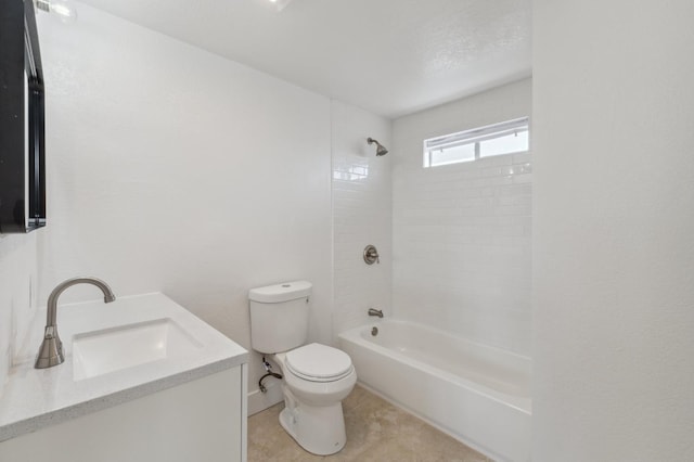 full bathroom with tiled shower / bath combo, vanity, tile patterned flooring, and toilet