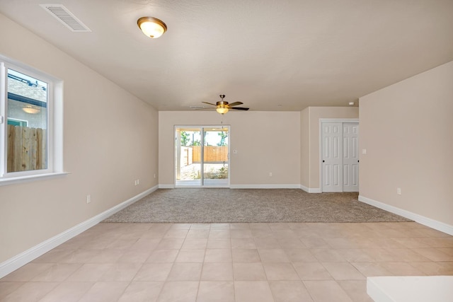 208 E Florence Ave, Fresno, CA 93706 - unfurnished room featuring visible vents, baseboards, a ceiling fan, and light carpet