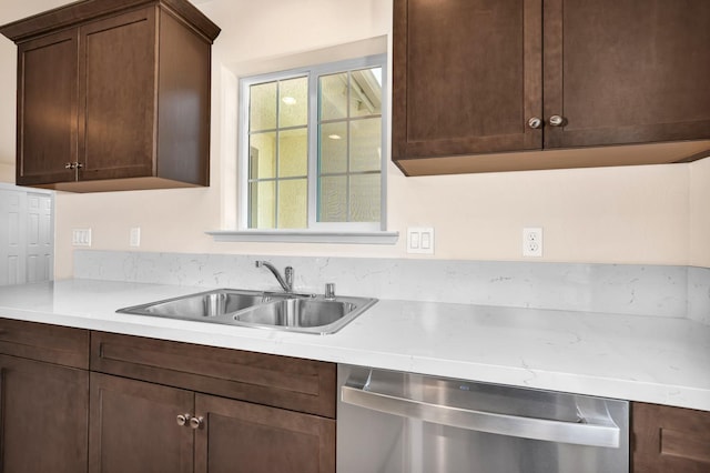 208 E Florence Ave, Fresno, CA 93706 - kitchen with a sink, stainless steel dishwasher, light countertops, and dark brown cabinetry