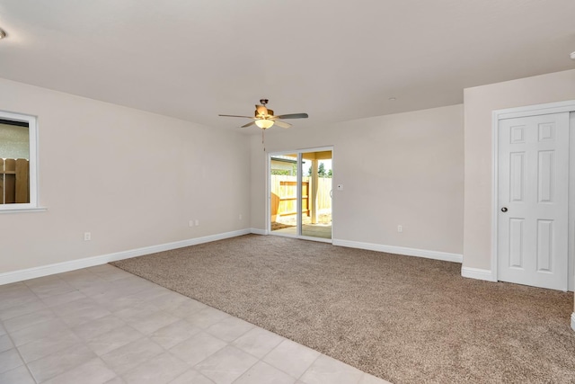 208 E Florence Ave, Fresno, CA 93706 - unfurnished room with a ceiling fan, baseboards, and light colored carpet