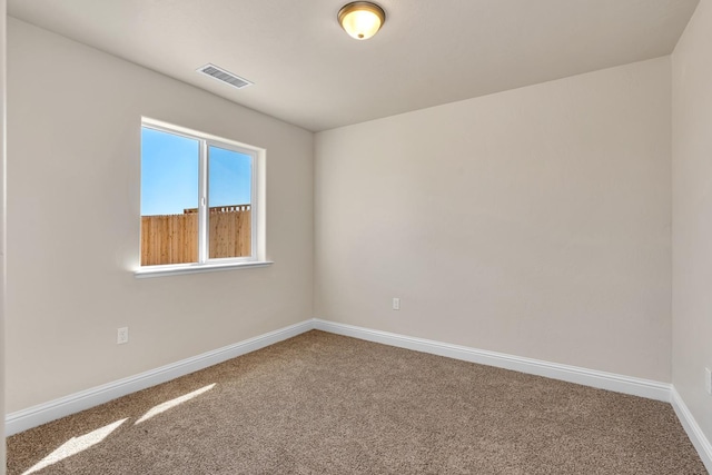208 E Florence Ave, Fresno, CA 93706 - carpeted empty room featuring baseboards and visible vents
