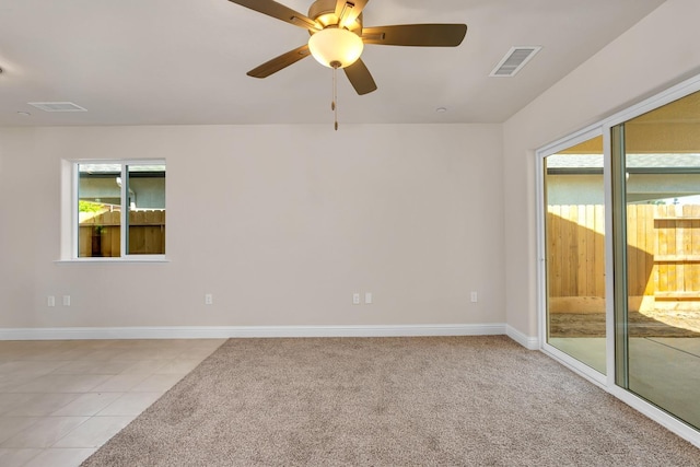 208 E Florence Ave, Fresno, CA 93706 - unfurnished room with light tile patterned floors, visible vents, baseboards, and ceiling fan